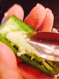 Clean seeds out of peppers with a teaspoon. Or just reduce the number of peppers in the recipe.