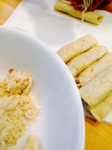Filling Tortillas with Chicken Mixture